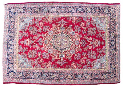 Lot 681 - A Persian Kirman carpet.
