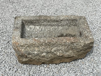 Lot 765 - A weathered granite trough.