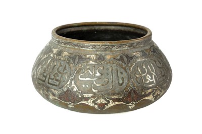 Lot 598 - A Mamluk revival bronze bowl with silver and copper inlay.