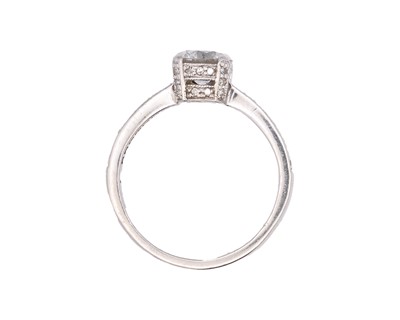 Lot 180 - A platinum and diamond set ring.