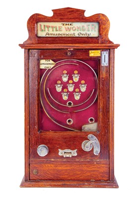 Lot 166 - An early 20th century coin operated amusement arcade machine.