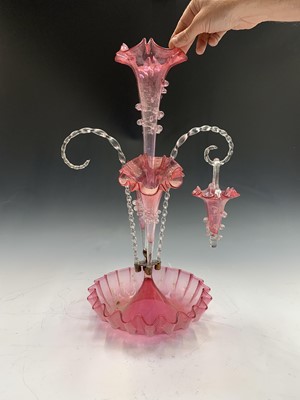 Lot 942 - A Victorian cranberry glass epergne...