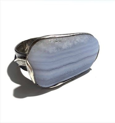 Lot 2433 - Helen Feiler silver ring set with blue lace...