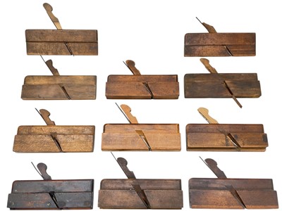 Lot 125 - A group of 11 stained beech moulding planes.