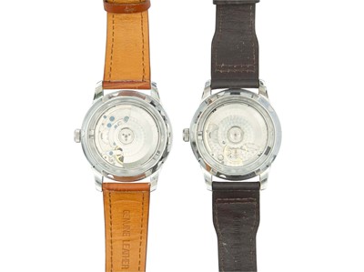 Lot 1097 - PARNIS - A selection of three gentleman's automatic stainless steel wristwatches.