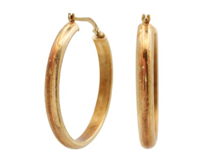 Lot 64 - A pair of 9k gold hollow hoop earrings.
