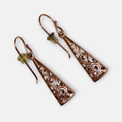 Lot 176 - A pair of 9k rose gold pendant earrings.