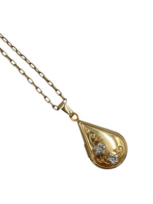 Lot 152 - A 9k gold teardrop-shaped locket pendant on a 9k cable chain.