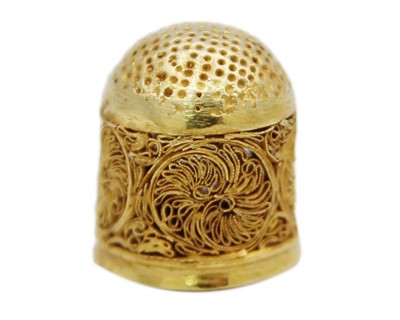 Lot 150 - An 18th-century Eastern high-purity gold (tests 22k) filigree thimble.
