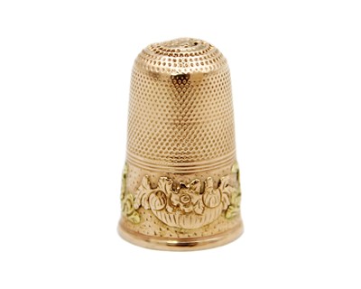 Lot 156 - A 19th century yellow and rose gold thimble.