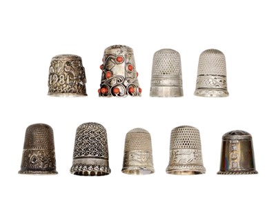 Lot 182 - A selection of nine silver thimbles.