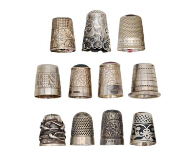 Lot 180 - A selection of eleven silver thimbles.