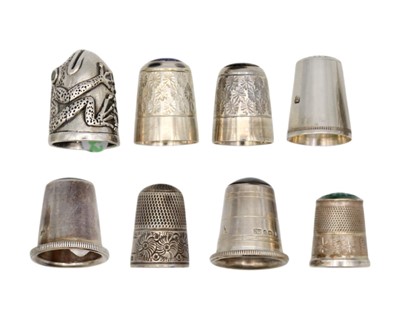 Lot 181 - A collection of eight silver thimbles.
