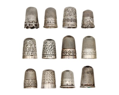 Lot 163 - A collection of twelve silver thimbles.