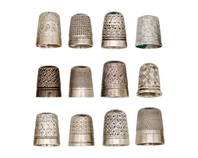 Lot 164 - A collection of twelve silver thimbles, eleven by Charles Horner.