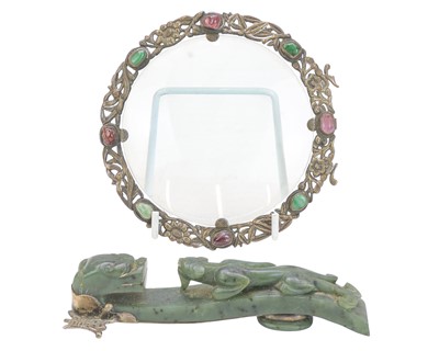 Lot 592 - A Chinese silvered and stone set magnifying glass with jade belt hook handle.
