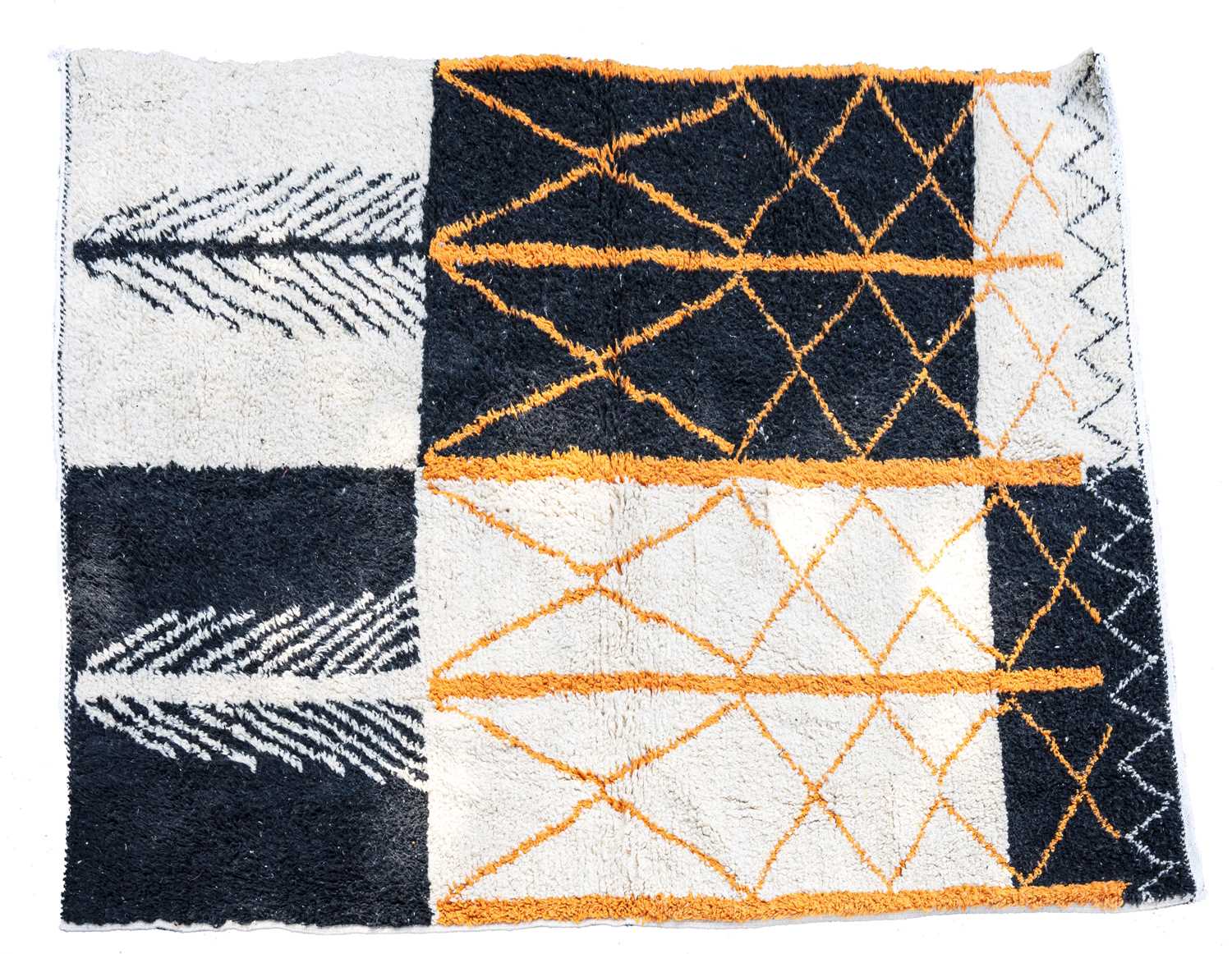 Lot 678 - A Moroccan Berber wool abstract design rug.