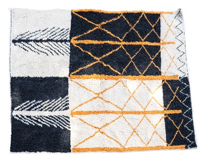 Lot 678 - A Moroccan Berber wool abstract design rug.
