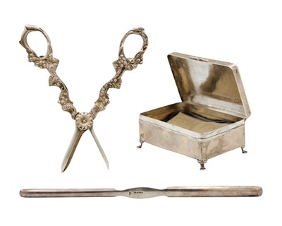Lot 82 - A George V silver rectangular hinge lidded trinket box by William Neale & Son Ltd.