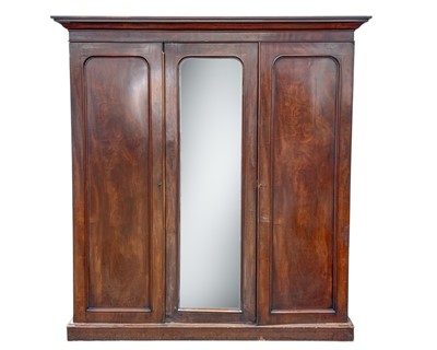 Lot 874 - A Victorian mahogany triple wardrobe.