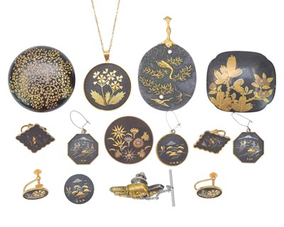 Lot 625 - A pair of Japanese damascene earrings.