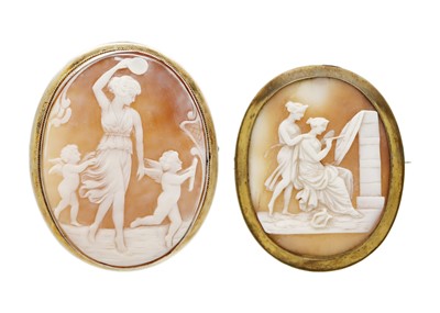 Lot 13 - Two large shell cameo brooches.