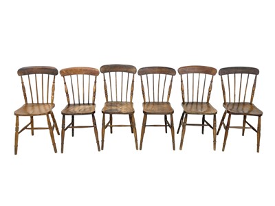 Lot 883 - Six beech and elm dining chairs.