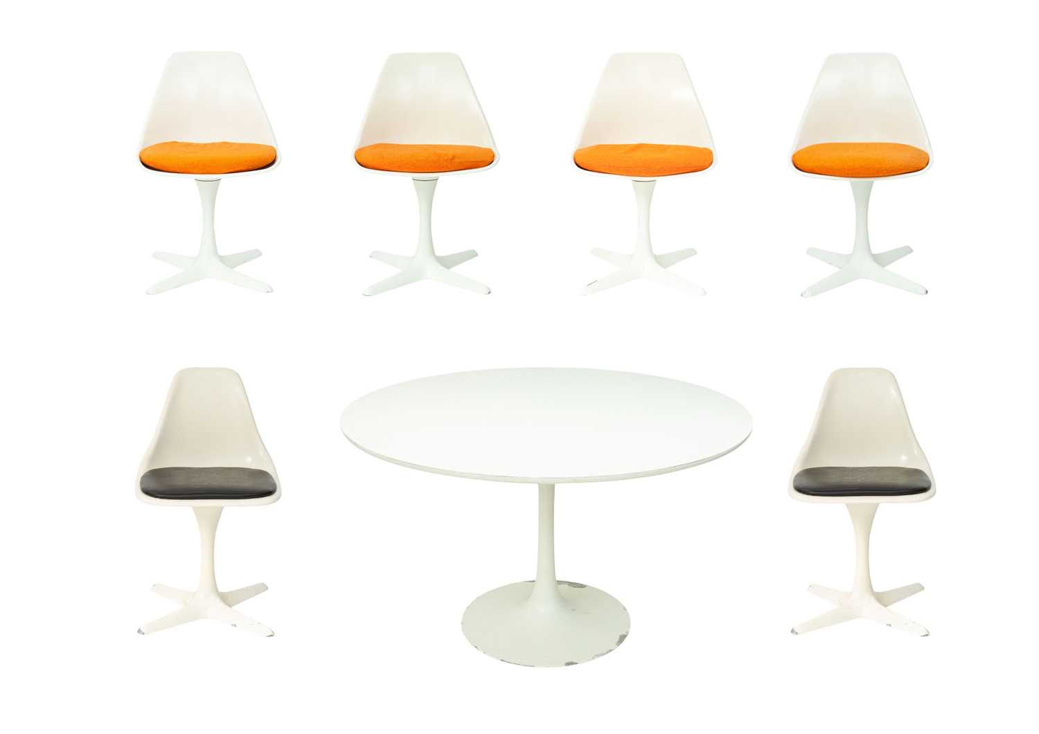 Lot 703 - An Arkana tulip table and six chairs.