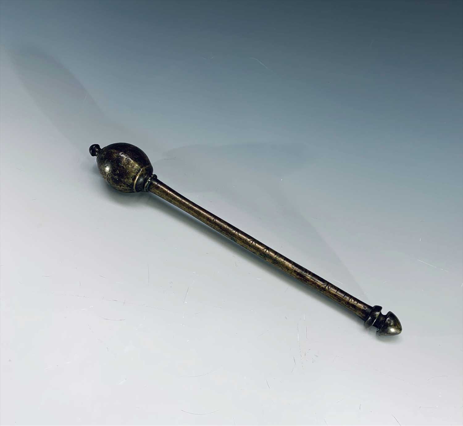 Lot 253 - A bronze cosh, 19th century, length 32cm.