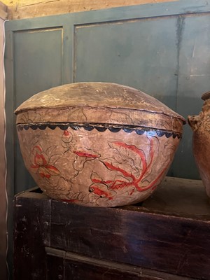 Lot 10 - A decorative large Chinese papier mache pot and cover.