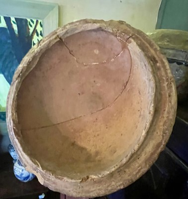 Lot 11 - A large terracotta crock and cover.