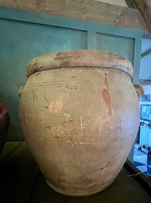 Lot 11 - A large terracotta crock and cover.