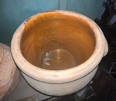 Lot 11 - A large terracotta crock and cover.