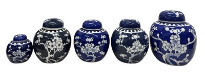 Lot 55 - Five Chinese prunus pattern ginger jars, all...