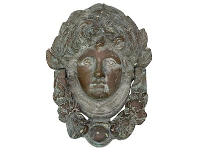 Lot 29 - A brass door knocker.
