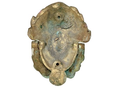 Lot 29 - A brass door knocker.