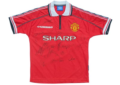Lot 298 - Manchester United treble winners, 1998-99, A signed Umbro shirt.
