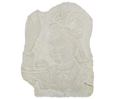 Lot 569 - A Tang-style carved limestone fragment.
