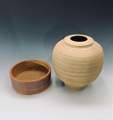 Lot 1049 - A large unglazed stoneware vase of bulbous...