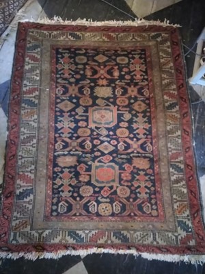 Lot 14 - A Caucasian Rug.