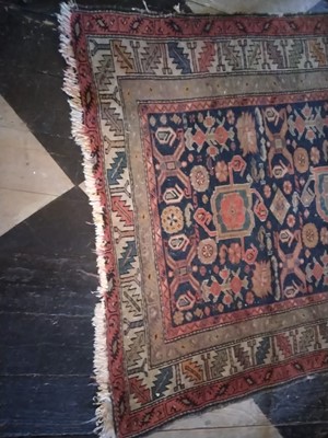 Lot 14 - A Caucasian Rug.