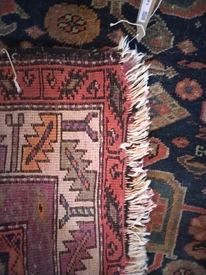 Lot 14 - A Caucasian Rug.