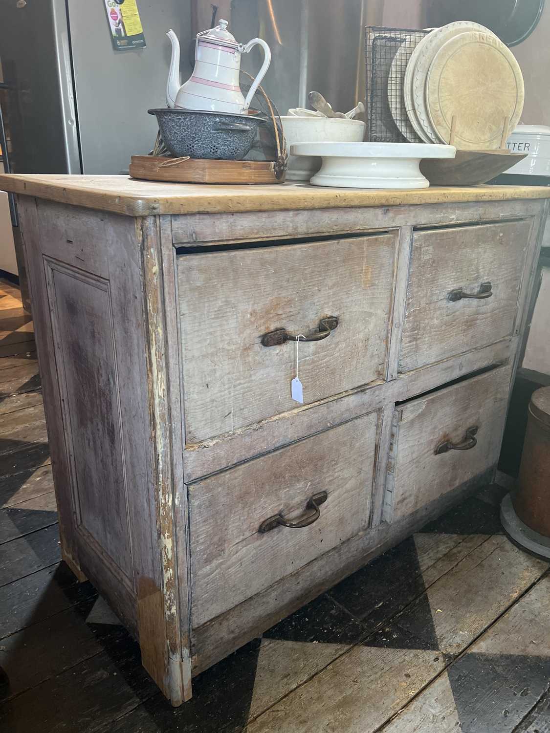 Lot 21 - A Victorian scrub top pine side cabinet.