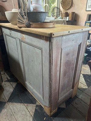 Lot 21 - A Victorian scrub top pine side cabinet.