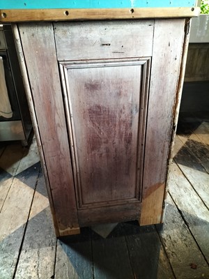 Lot 21 - A Victorian scrub top pine side cabinet.