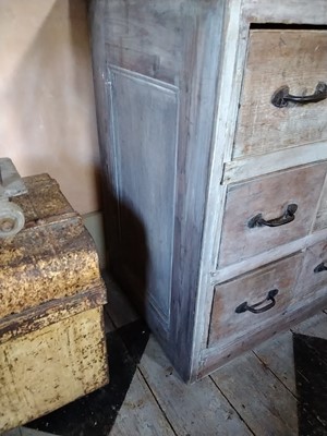 Lot 22 - A substantial Victorian pine shop run of drawers.