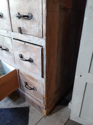 Lot 22 - A substantial Victorian pine shop run of drawers.