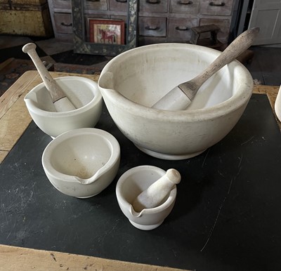 Lot 30 - A large white stoneware pestle and mortar.
