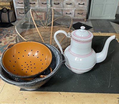 Lot 32 - Two enamel collanders.