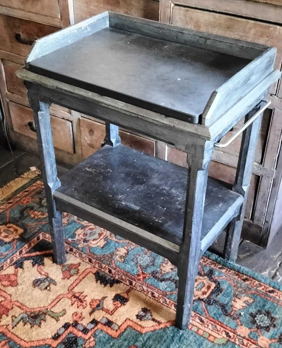 Lot 41 - A Grey painted two tier side table.